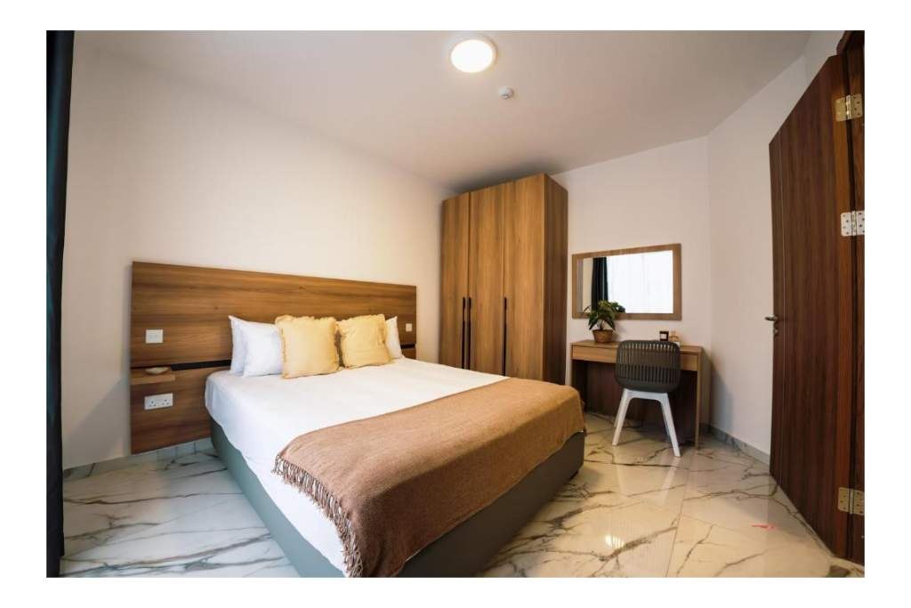 Comfortable bedroom in a HostMT apartment